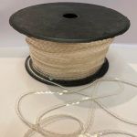 1м Пайетки прозрачные плоские на белой нитке в катушке (уп)